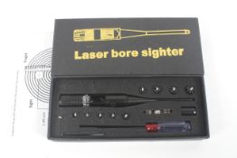 A Laser bore sighter kit. In original box.