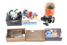 A collection of fishing reels, etc.