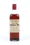 A bottle of circa 1940s Fine Old Jamaica Rum. T.
