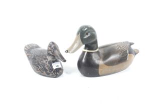 A pair of vintage wooden decoy ducks. One mallard and one female, largest L38cm.