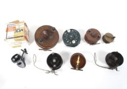 A collection of vintage fishing reels.