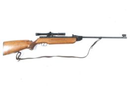 A Weirmach HW35 .22 air rifle. With scope and sling.