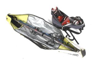 A pair of skis and ski boots.