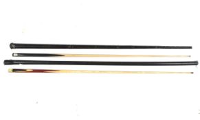 A pair of Riley of Accrington snooker cues.