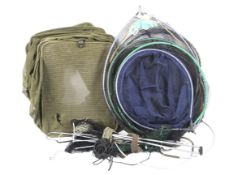 A collection of assorted fishing keep and landing nets.
