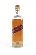 A bottle of Johnnie Walker Red Label Old Highland Whisky.