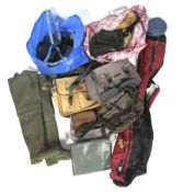 Two large bags of fishing shoulder and tackle bags, waders,