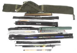A collection of fishing rods in a rod bag. Comprising mainly Shakespeare rods, etc.
