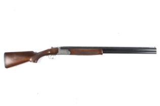 A Browning Medallist over and under 12 gauge shotgun.