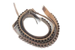 Three leather 12 gauge shotgun cartridge belts.