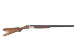 A Mcnab Highlander over and under 28 bore shotgun.