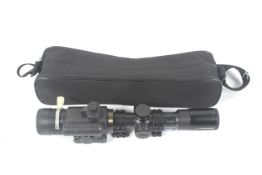 A Photon Riflescope 3.5x42/ 5x42. Night sight capability, with instruction book and case.