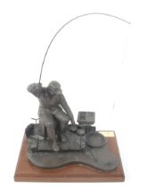 David Hughes, bronzed resin sculpture of a coarse fisherman landing a fish.