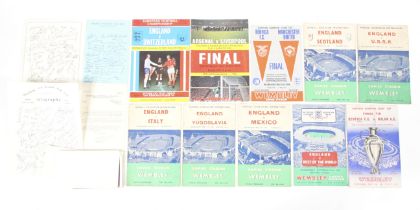 A collection of football programmes.