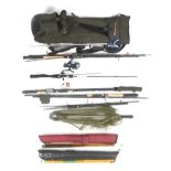 A collection of fishing rods and reels in rod bag.