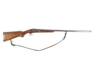 A Russian single barrel 12 gauge shotgun.