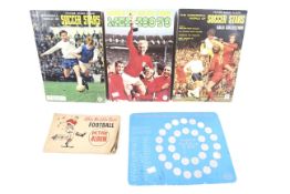 A collection of football collectors cards and coin set from the 1970s.