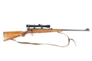 A Bruno bolt action .22 calibre rifle.