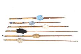 A collection of six split cane fly and spinning rods.