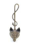 A Brass doorstop modelled as a foxes head.