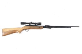 A foreign air rifle. .22 cal, underlever action complete with Apollo 4x32 scope.