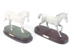 Two Royal Doulton Beswick figures of racehorses. Comprising Desert Orchid and One Man, H24cm.