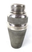 A vintage silver plated cocktail shaker. S. J. Levi & Co.