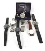 An assortment of wrist watches. Including a boxed Tissot, an Accurist, Sekonda, etc.