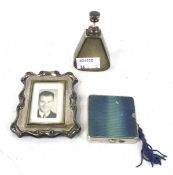 A Victorian silver picture frame, silver plated perfume bottle and a contemporary Moxo compact.