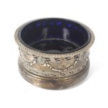 An Edwardian silver salt of circular form.