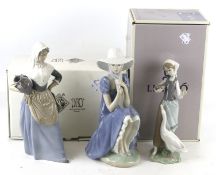 Three Spanish porcelain figures.