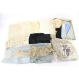 A collection of Victorian and later fabrics and lace.