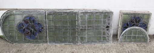 A collection of leaded glass window panels.