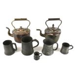 Five 19th century and later pewter tankards and two copper kettles.
