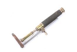 A vintage JS&S hand soldering iron.