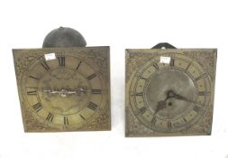 Two brass faced long case clock mechanisms.