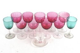 A collection of assorted glassware. Including nine cranberry drinking glasses, etc. Max.