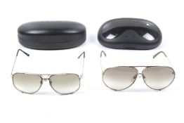 Two pairs of vintage sunglasses.