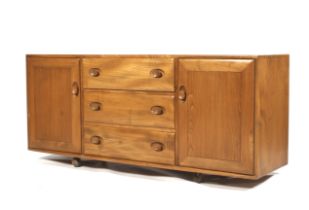 A mid-century light oak Ercol (blue & gold label) mobile sideboard.