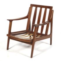 A Scandinavian Afromosia mid-century lounge open arm chair frame with pegged construction.