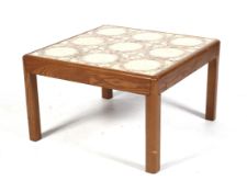 A mid-century square tile top coffee table.