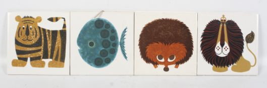 A set of four 1960s Kenneth Townsend dust pressed tiles from the 'Menagerie' series.