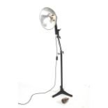 A Pifco mid-century radiant heat lamp with adjustable cast metal stand.