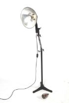 A Pifco mid-century radiant heat lamp with adjustable cast metal stand.