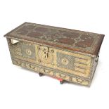 A contemporary Indian brass bound and studded trunk.