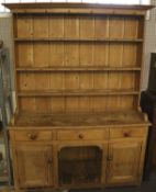 A vintage pine kitchen dresser.