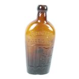 A vintage 'Warner's "safe" Cure' glass bottle.