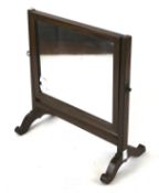 A small mahogany framed dress swing mirror.