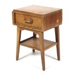A mid-century G Plan (EG gold label) oak bedside table. With a single drawer and shelf beneath.