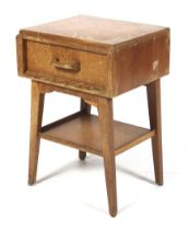 A mid-century G Plan (EG gold label) oak bedside table. With a single drawer and shelf beneath.